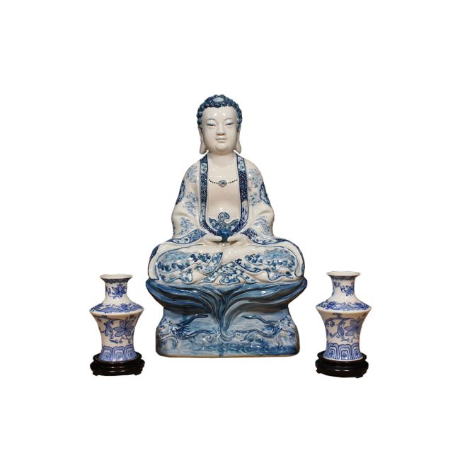 Statua di Buddha in ceramica blu e bianca con portacandele